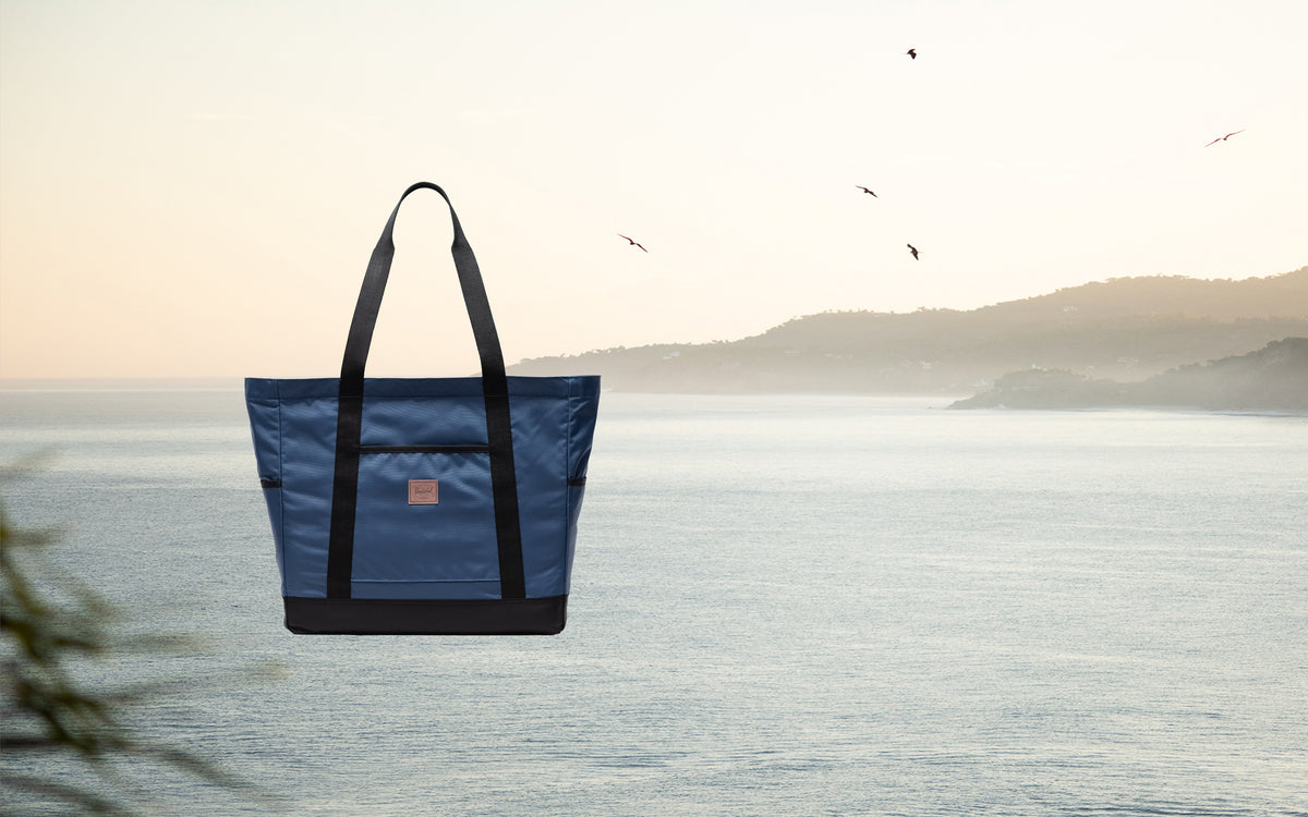 Herschel Heritage Tote bag in Oceana blue, lifestyle desktop view.