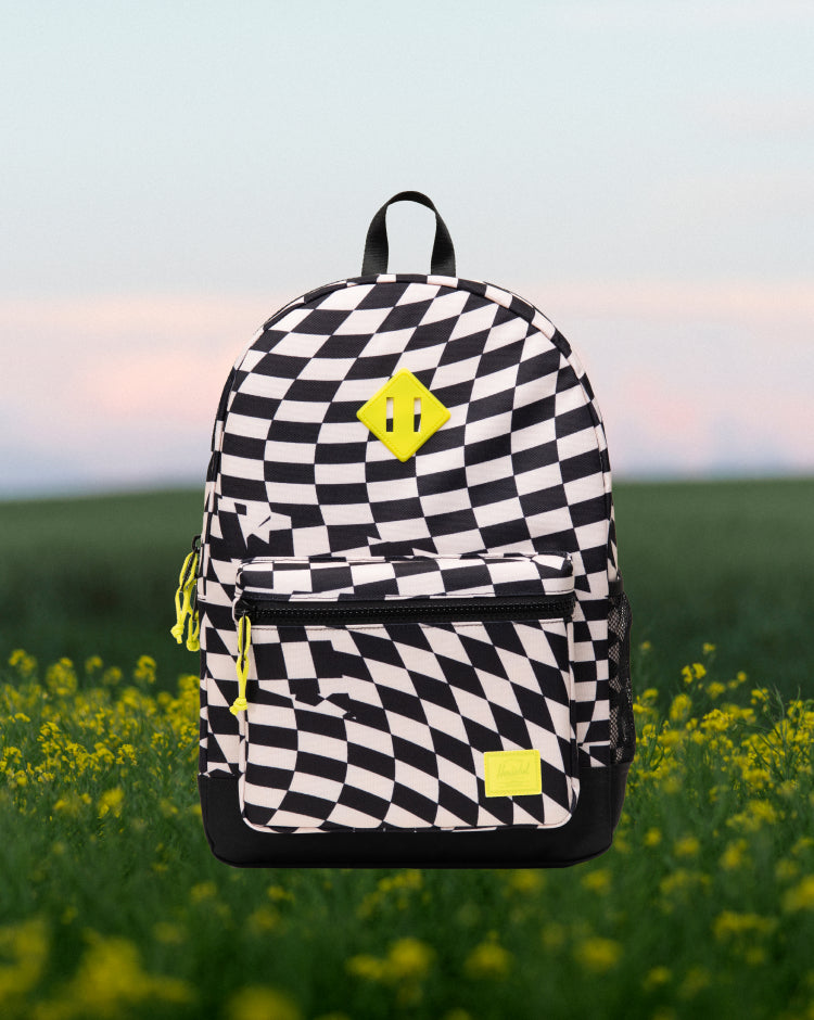 Herschel Supply Co. Heritage Kids Backpack in the Warp Check checkerboard pattern.