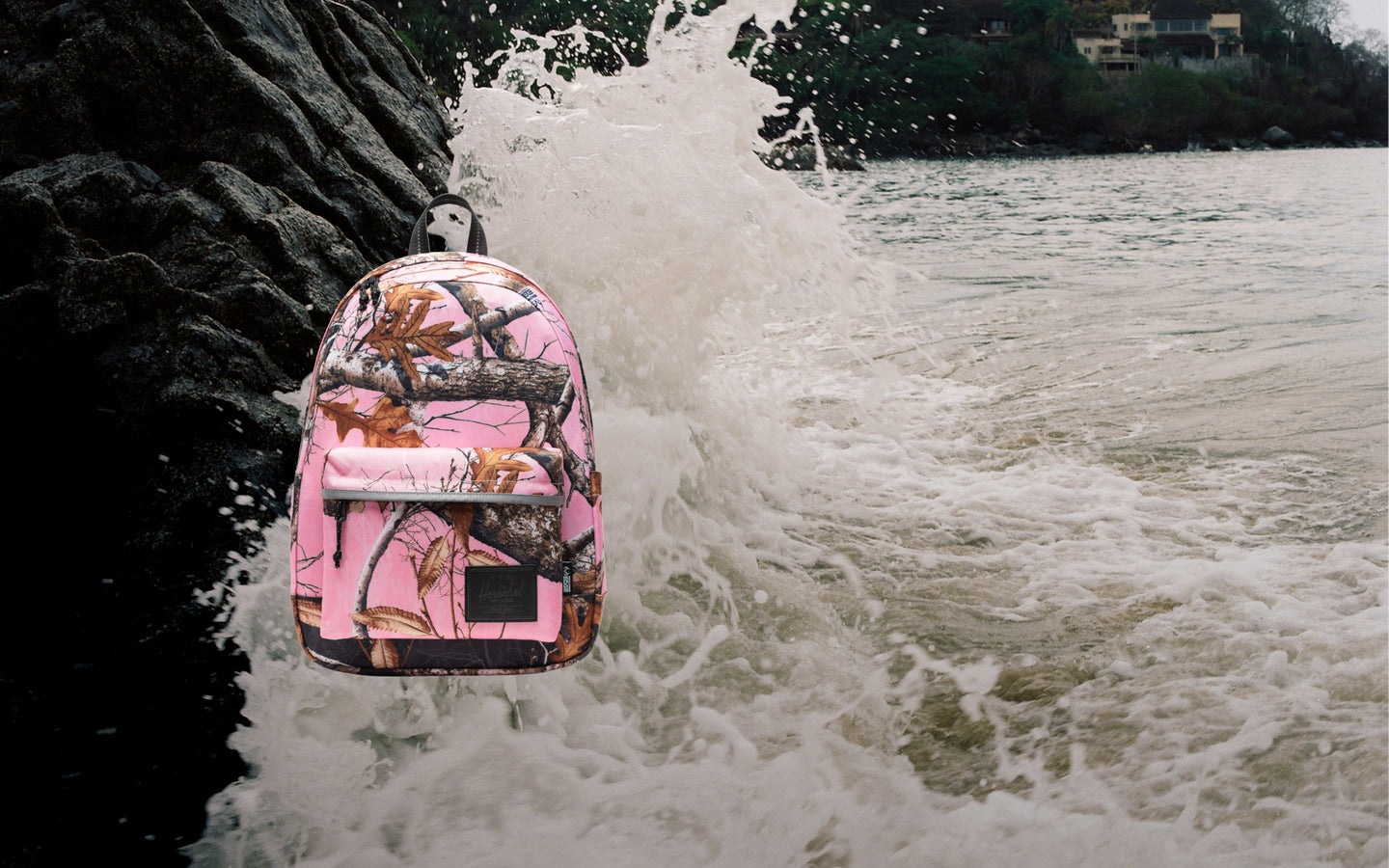 Herschel Classic Backpack in Realtree Edge Camo Pink/Black featuring a pink camouflage pattern with black accents.