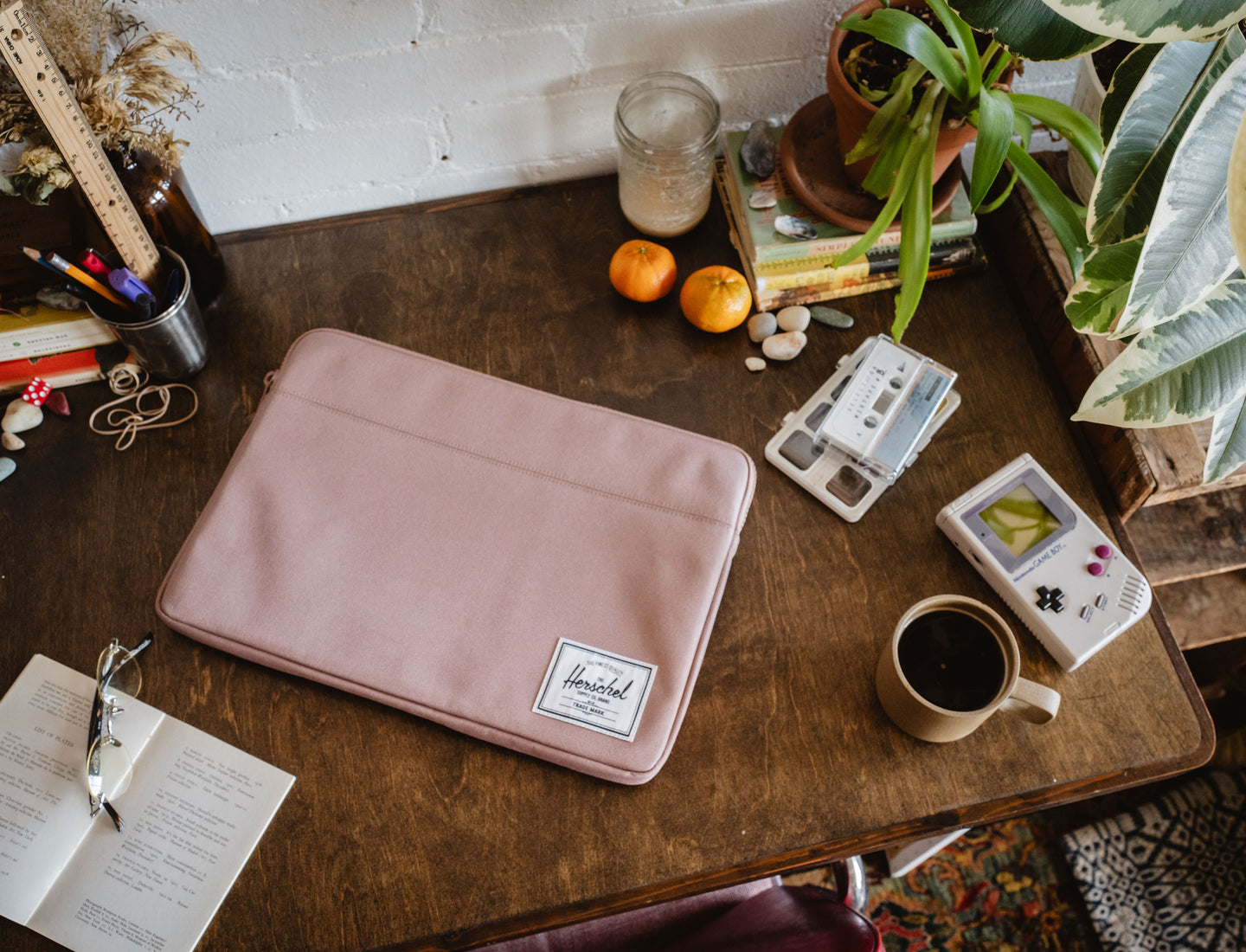 Herschel Supply Co. Anchor 15-16 Inch Sleeve in Ash Rose, a minimalist laptop sleeve with a clean, light pink design on a white background.