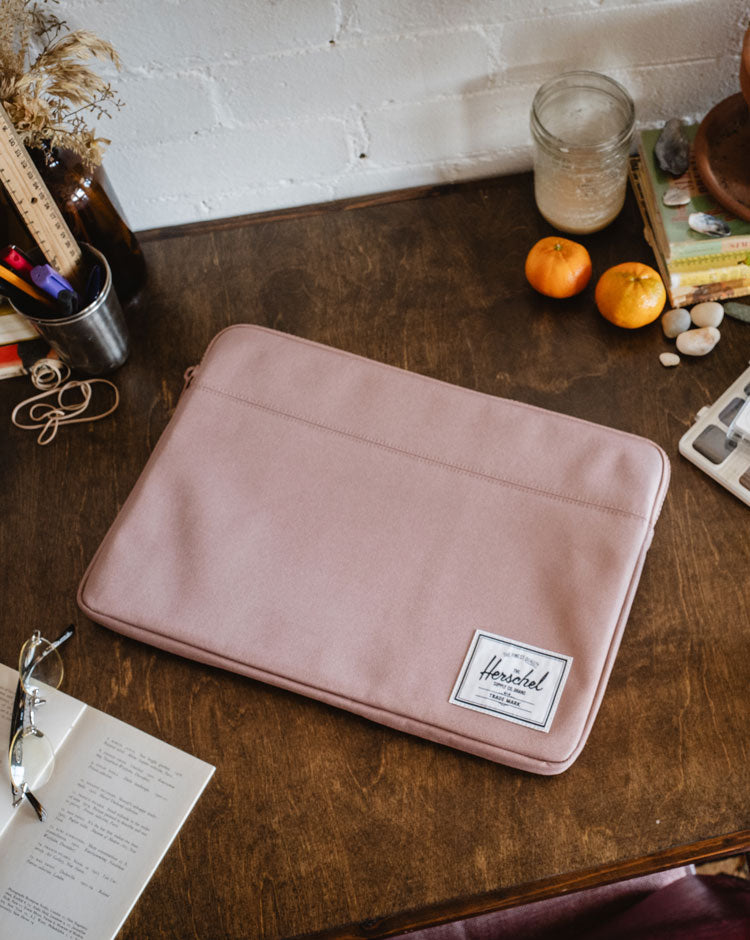 Herschel Supply Co. Anchor 15-16 Inch laptop sleeve in Ash Rose pink, featuring a minimalist design with a clean zip closure.