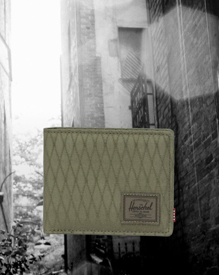 Herschel Supply Co. Roy Wallet in Ivy Green Diamond, featuring a classic bi-fold design with a textured diamond pattern fabric.