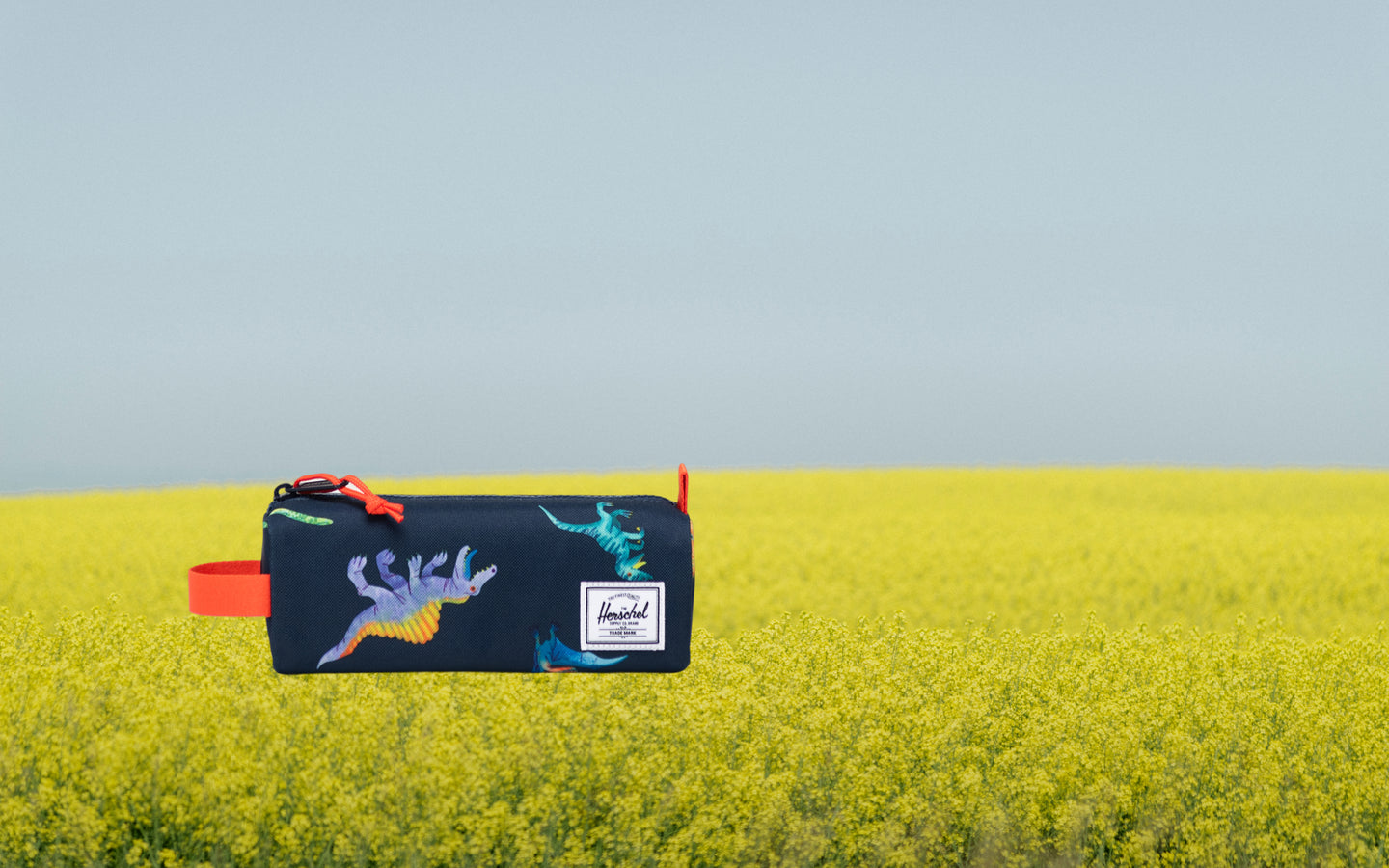 Herschel Supply Co. Settlement Pencil Case Little Herschel in Water Colour Dinosaurs Darkest Navy.