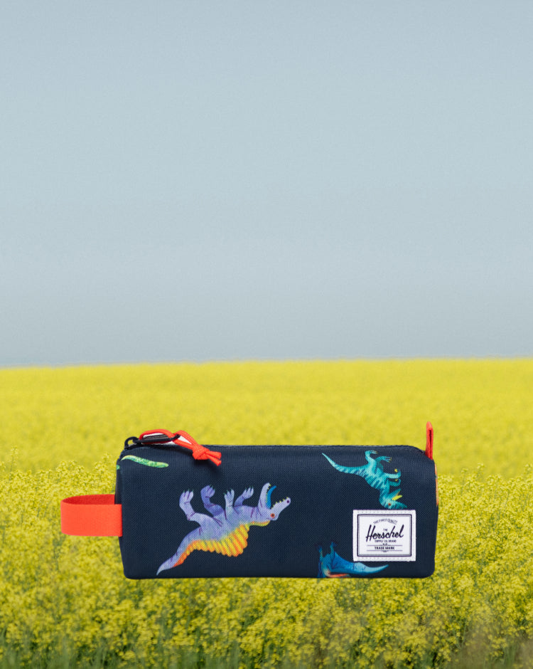 Herschel Settlement Pencil Case Little Herschel in Water Colour Dinosaurs Darkest Navy, shown from a front angle.