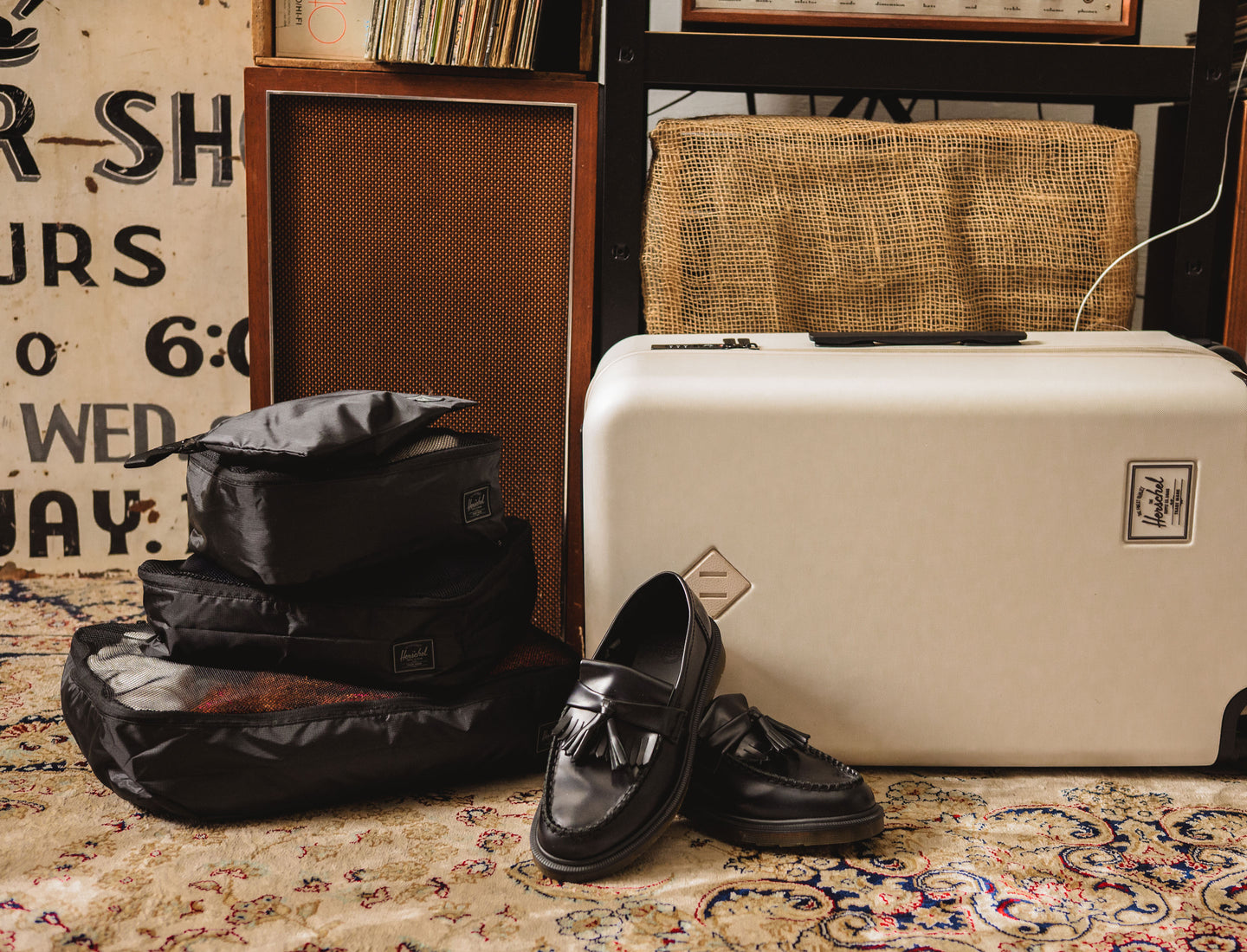 Herschel Supply Co. Kyoto Packing Cubes in Black Tonal organized neatly to show their sizes and sleek, textured design.