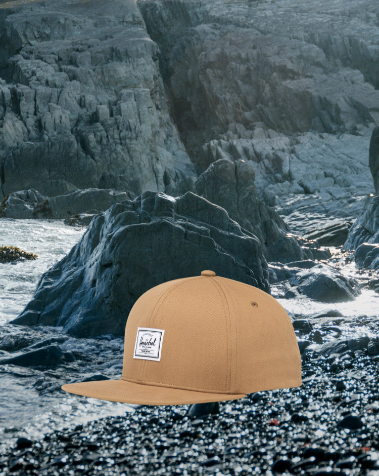 Herschel Supply Co. Whaler 6 Panel Cap in Antique Bronze, shown from the front.