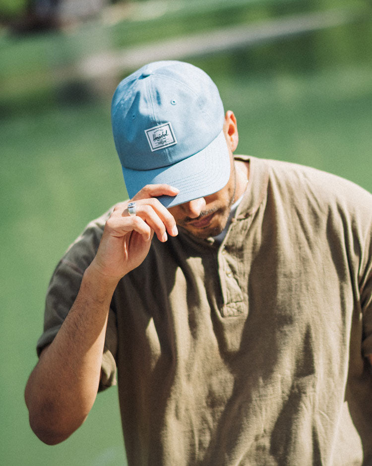 Herschel Supply Co. Sylas Classic Cap in Windward Blue, a light blue adjustable baseball hat shown from the front.