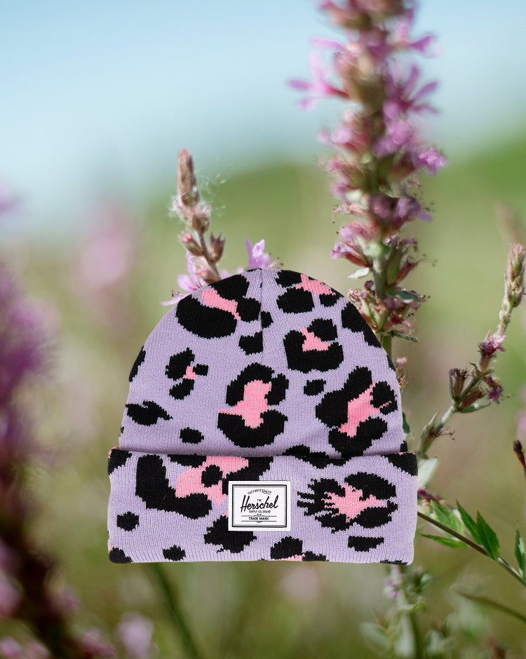 Herschel Supply Co. Elmer Kids Graphic Beanie in Scribble Leopard Sachet Pink, featuring a pink leopard print pattern.