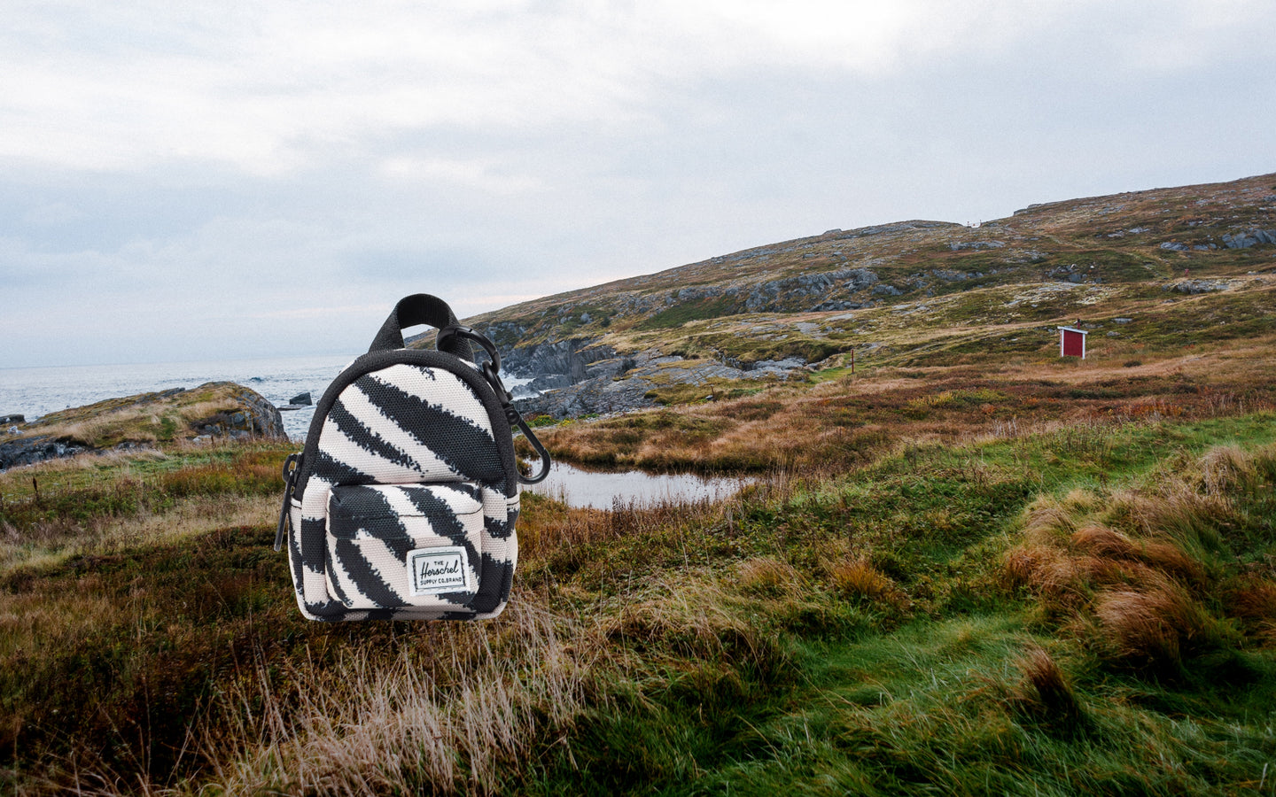 Herschel Supply Co. Herschel Classic Backpack Bag Charm in a black and white zebra print pattern.