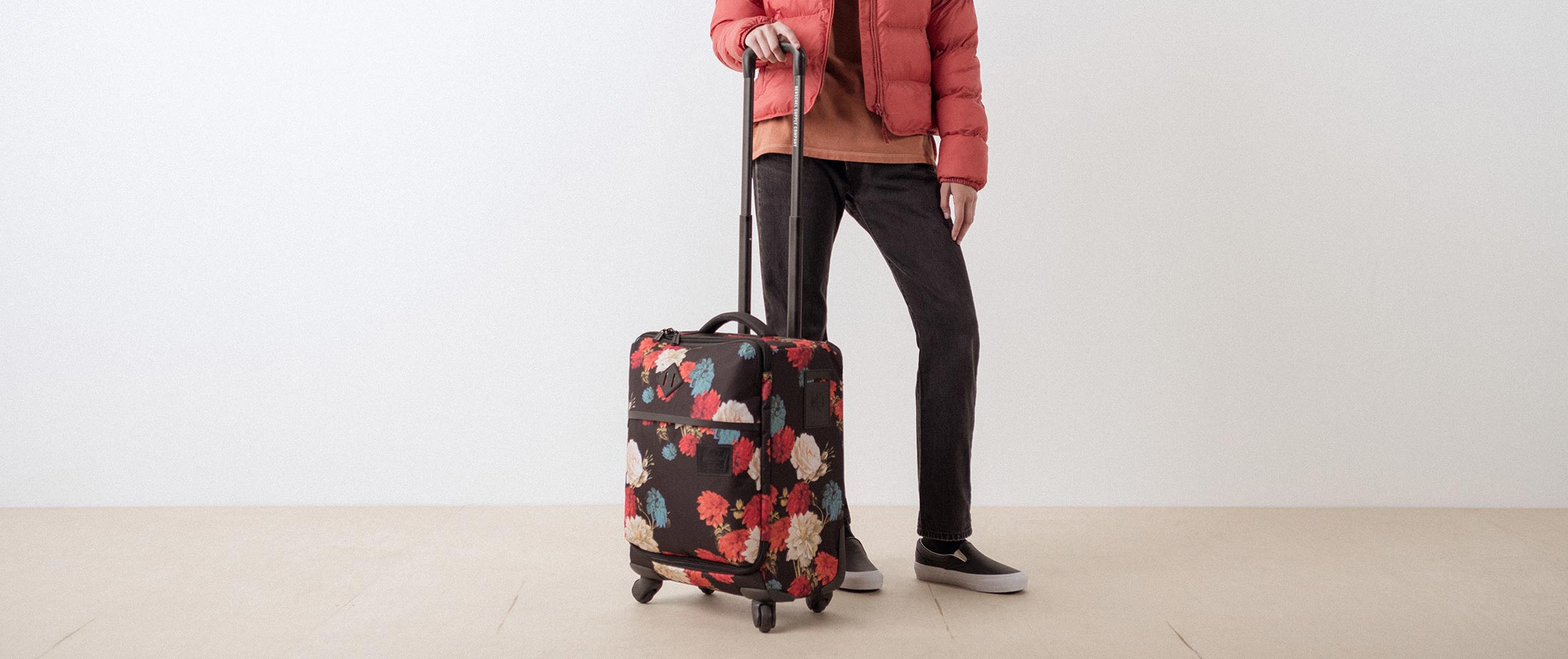 herschel pink suitcase