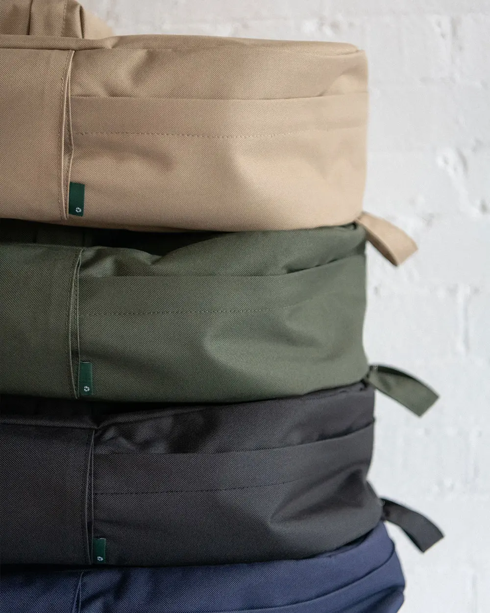 Herschel Redesigns Core Line to be More Sustainable – WWD