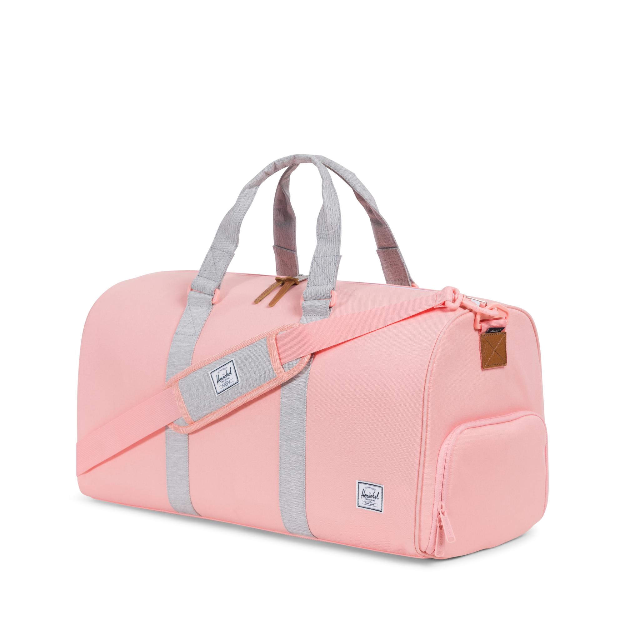 pink herschel duffle bag