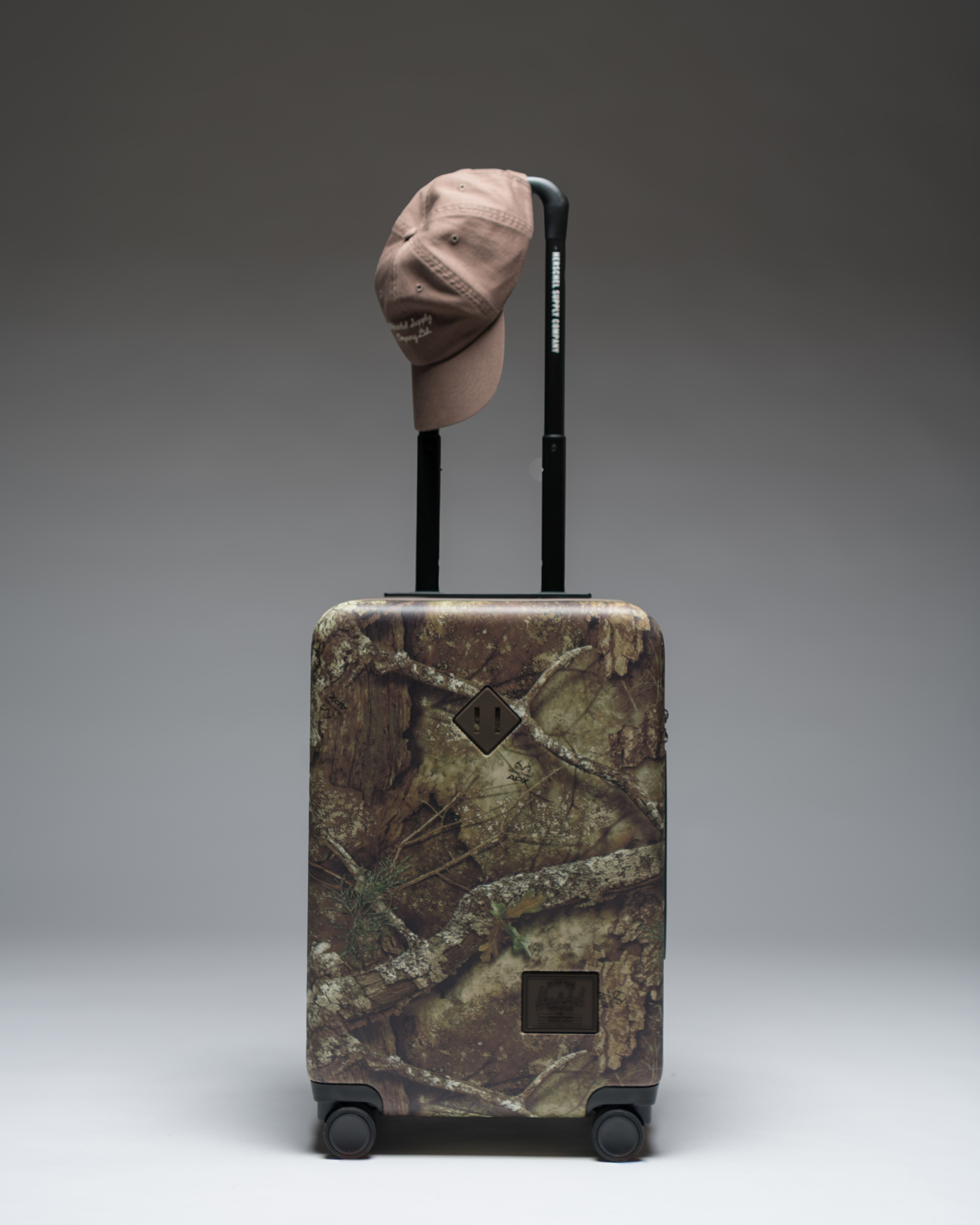 Realtree® Herschel Heritage™ Hardshell Luggage | Large Carry On